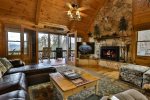 Gather around the stone fireplace or watch a movie